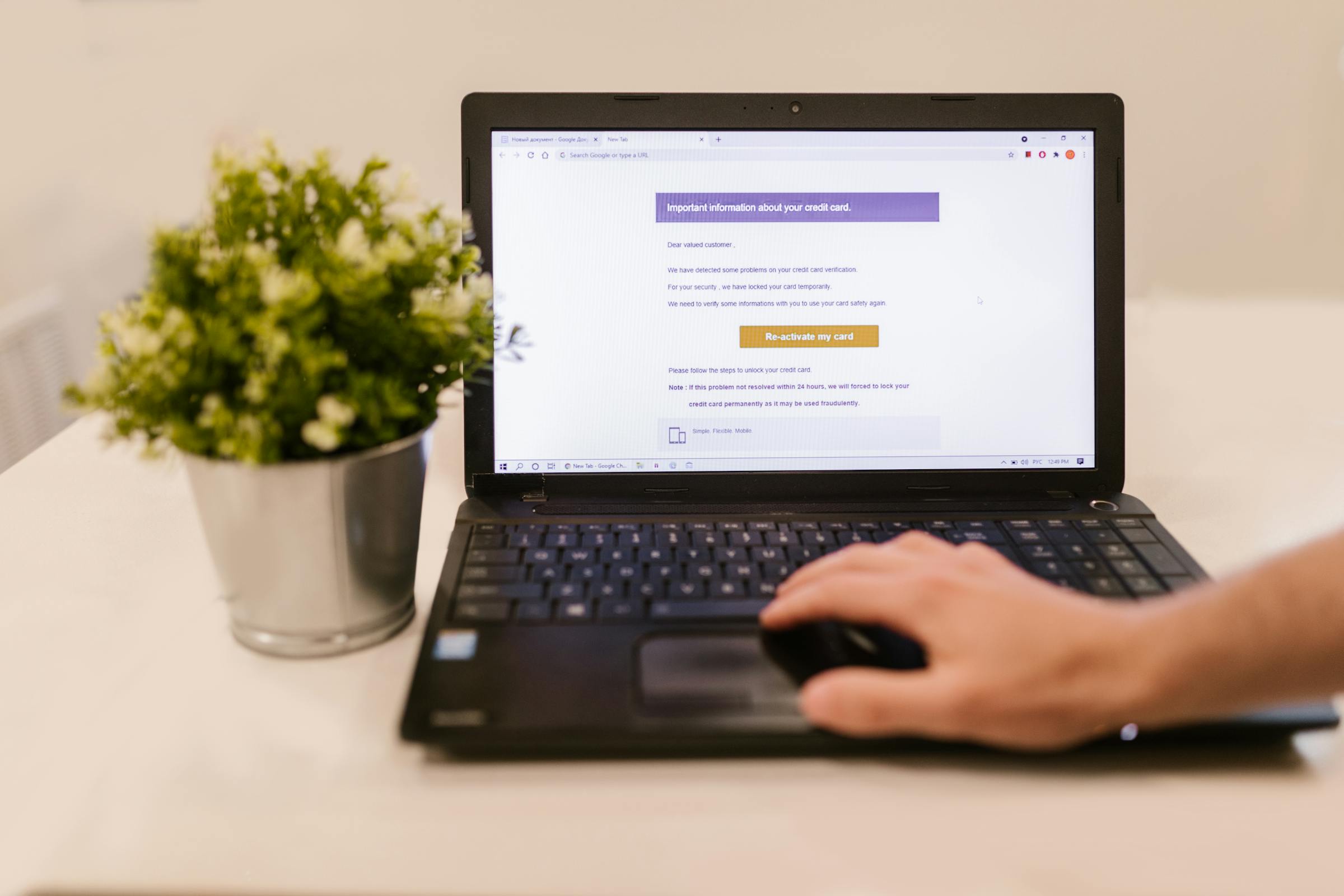 Marketer reading an email campaign on a laptop
