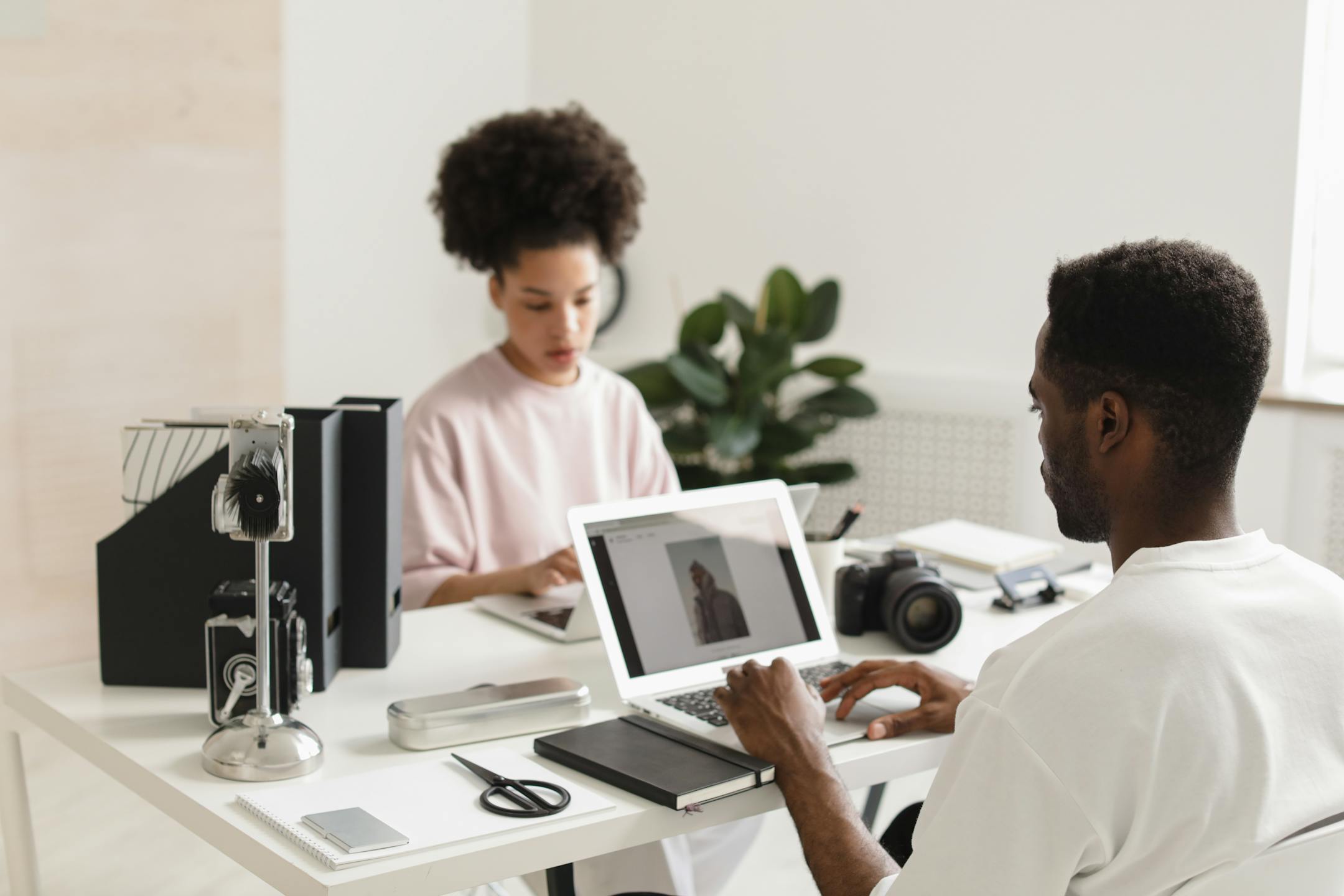 Marketing team drafting email copy together