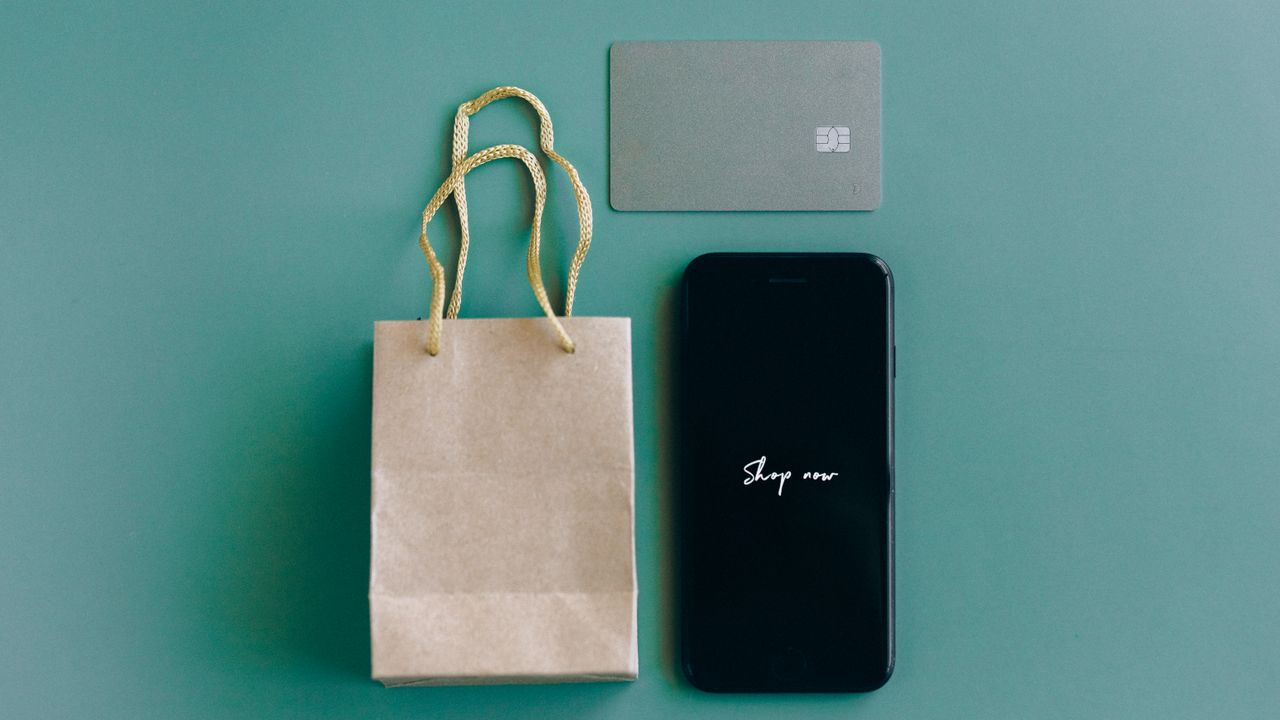 Shop-now text message on a phone