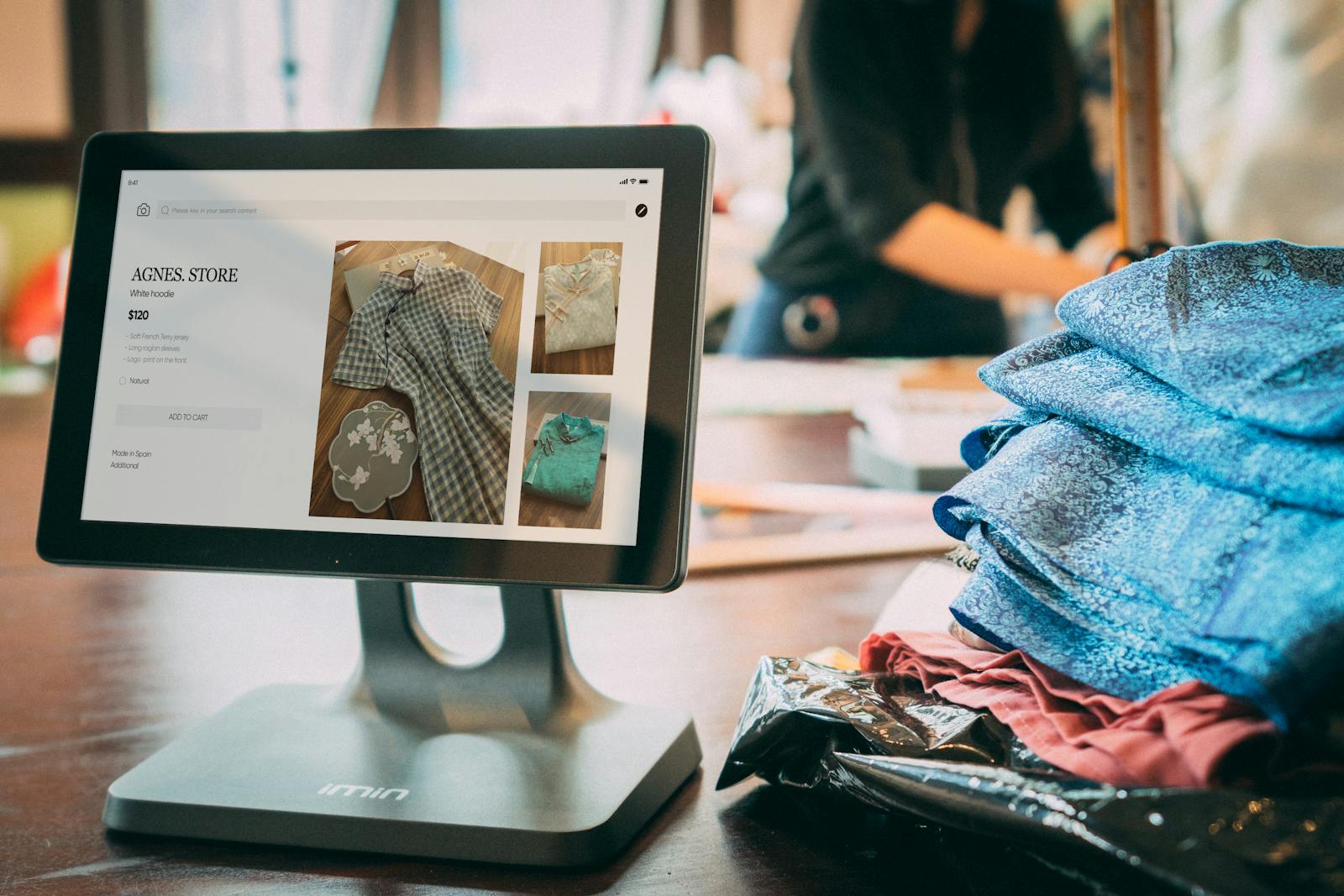 Point-of-sale screen in a fashion boutique syncing customer data