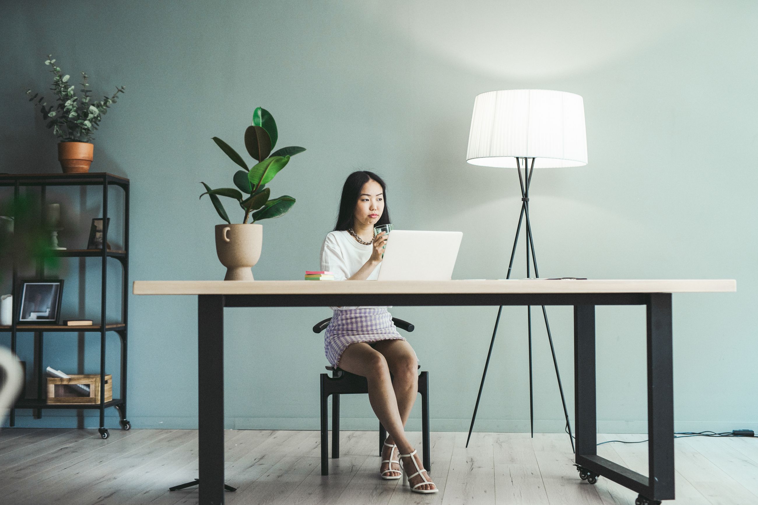 Marketer reviewing her customer data securely on a laptop