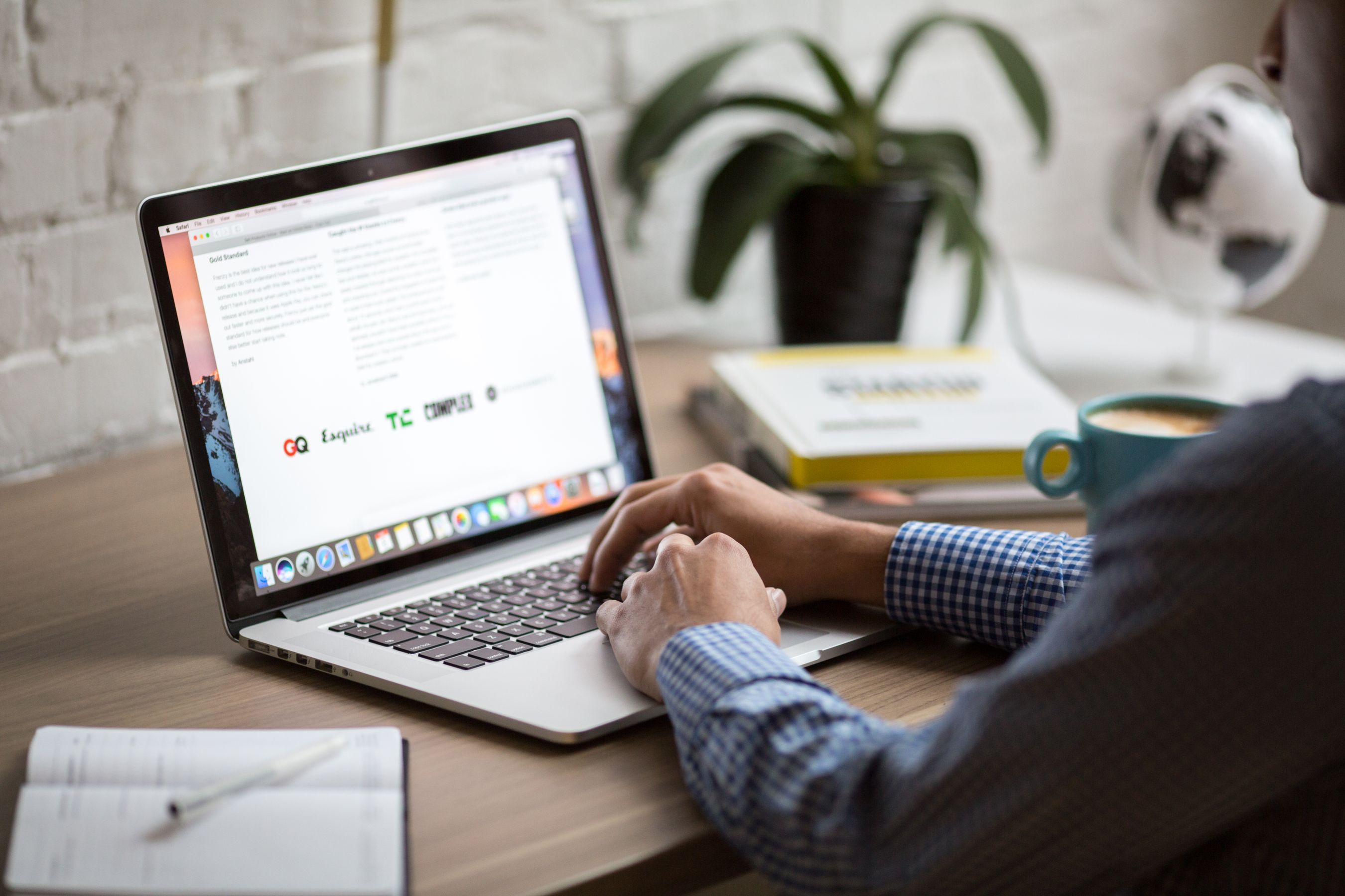 Marketer building a signup form on a laptop